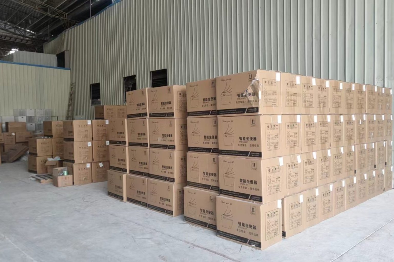 Finished smart toilet cartons staged for wholesale shipment