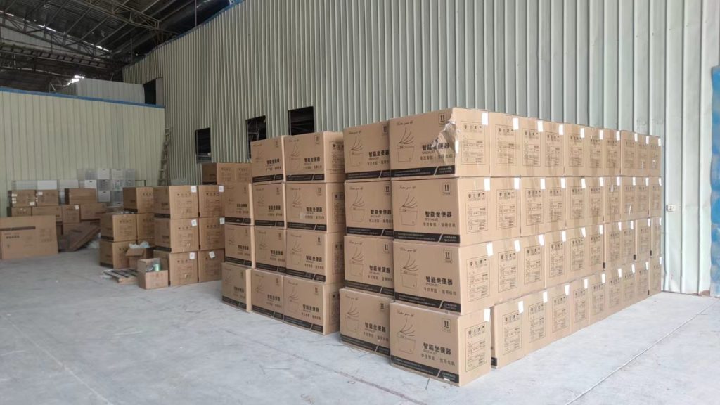 Bathroom factory production floor during quality review
